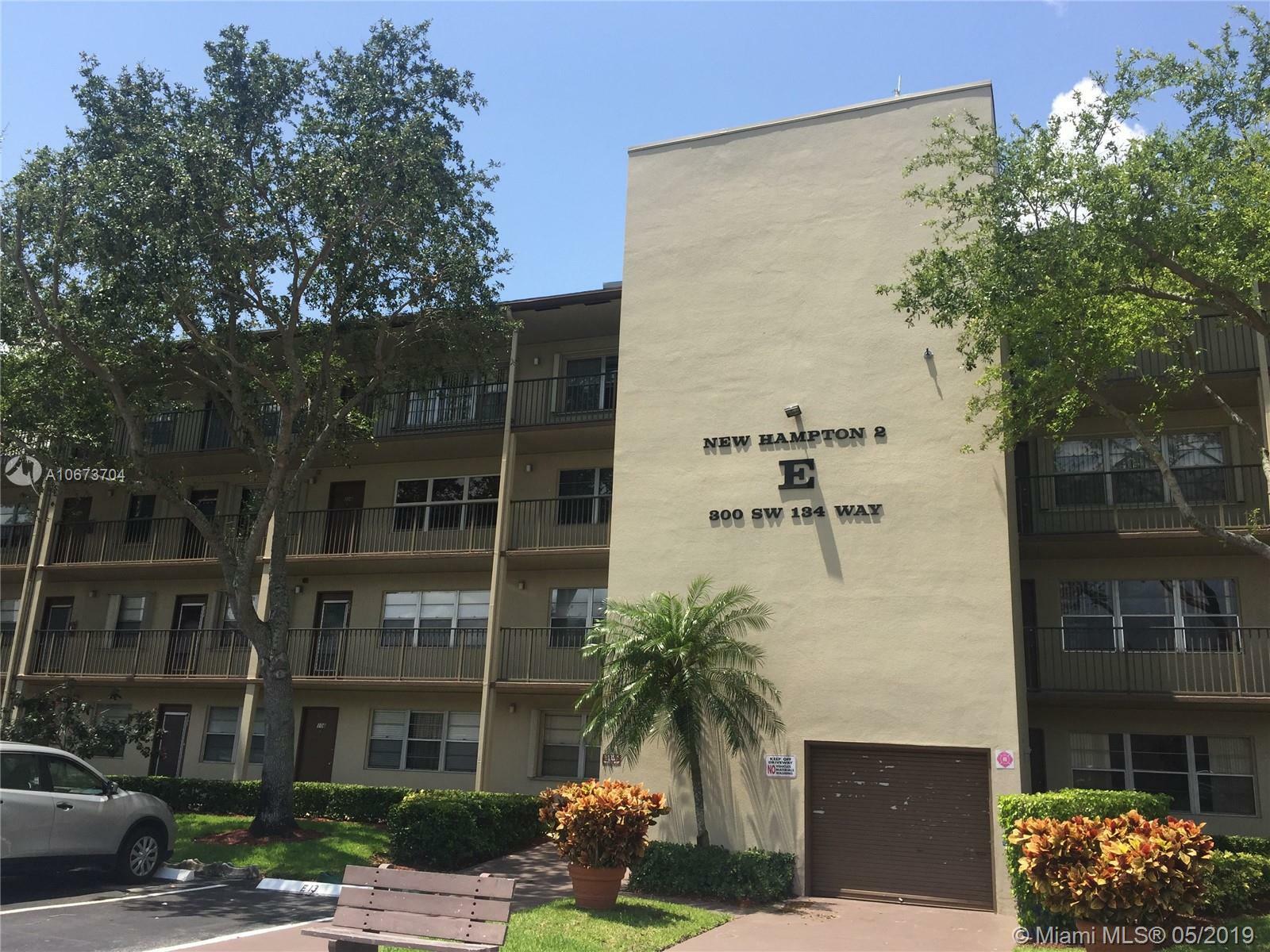 Property Photo: 300 SW 134th Way 104E FL 33027