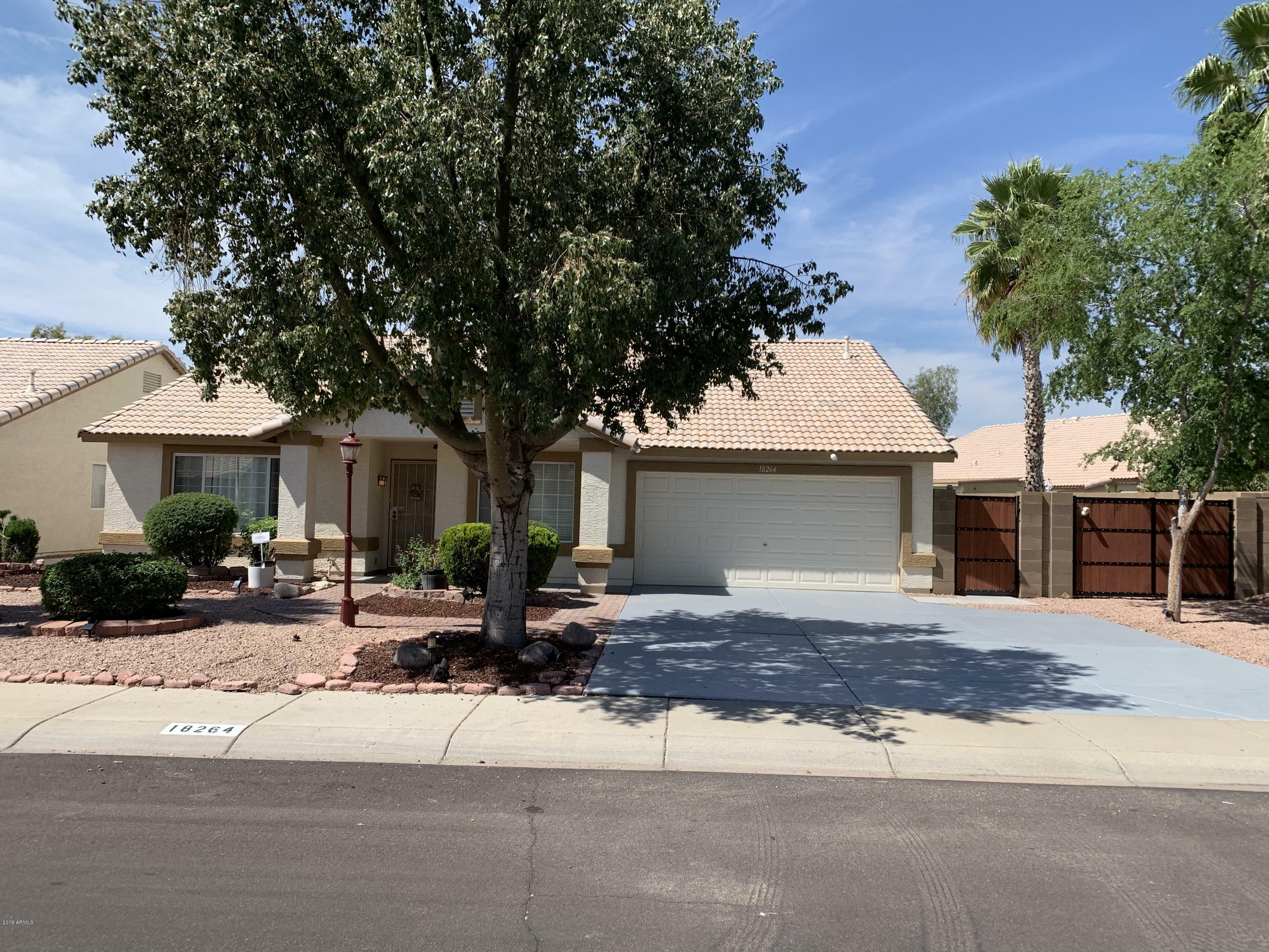 Property Photo: 18264 N 144th Avenue AZ 85374