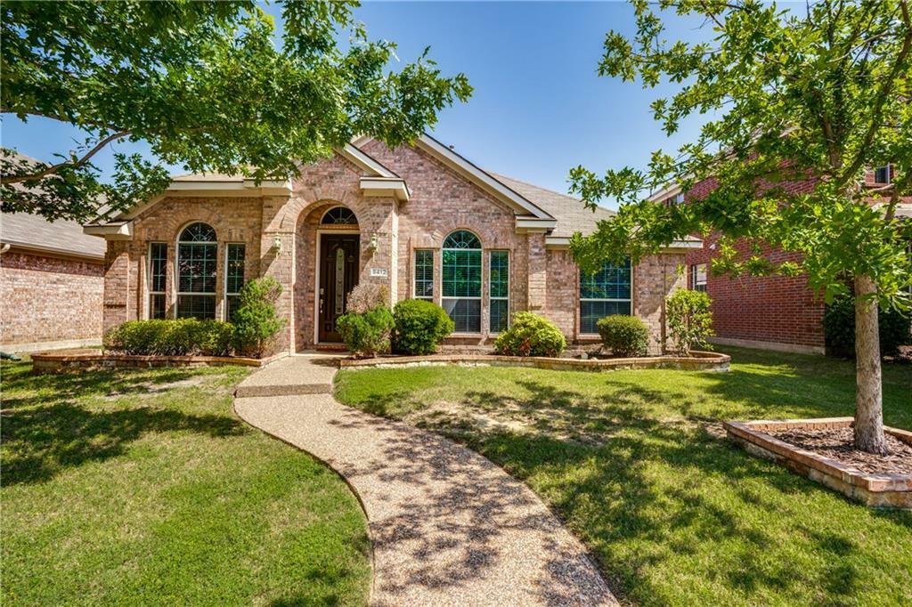Property Photo: 9412 Woodhurst Drive TX 75072