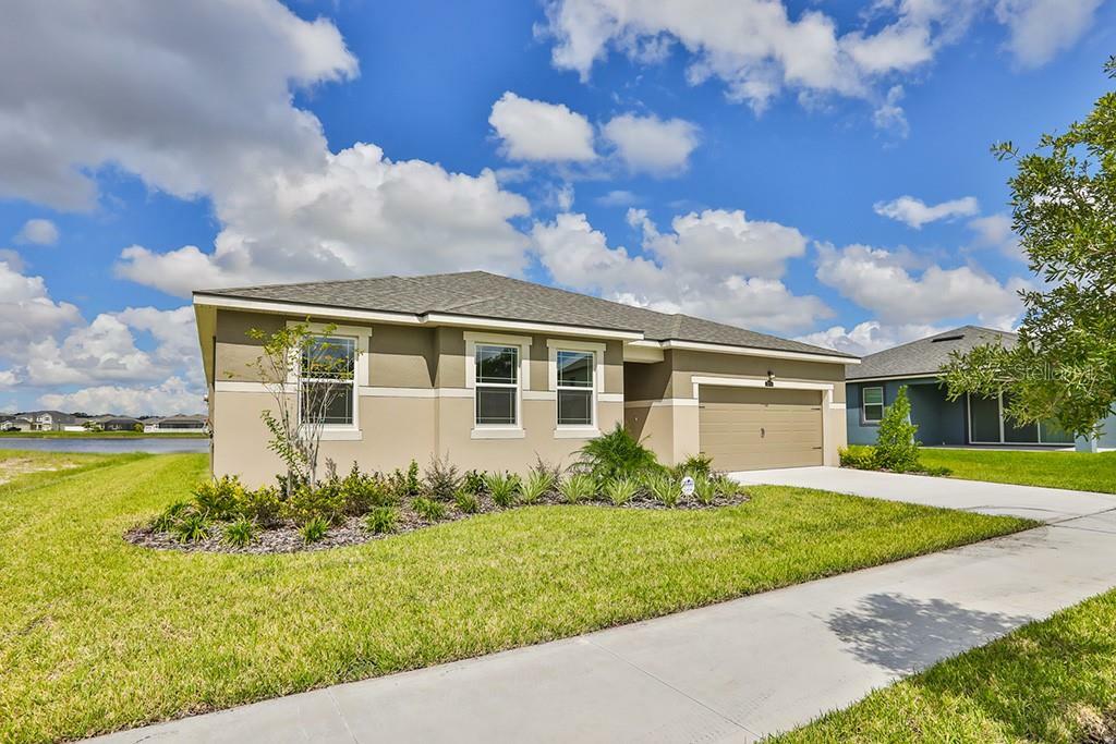 Property Photo:  13270 Baby Belle Drive 65E  FL 33579 