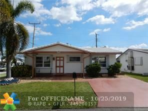 Property Photo:  4580 NW 17th Ave  FL 33309 