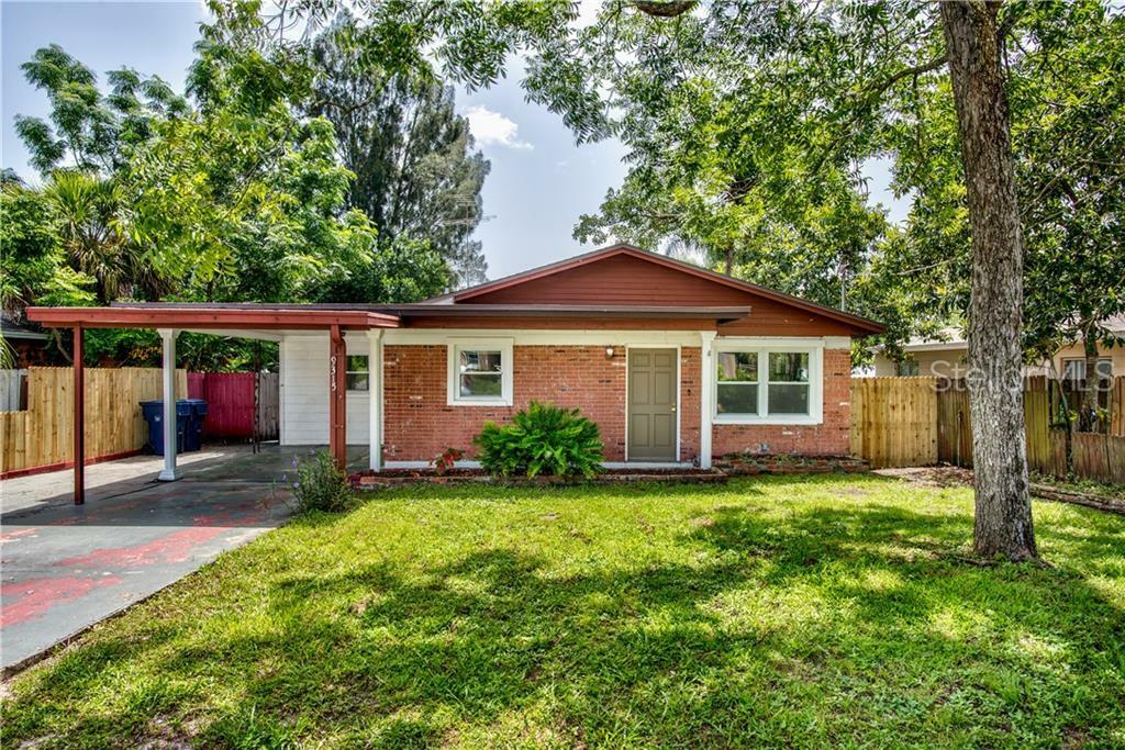 Property Photo:  9315 N Oakleaf Avenue  FL 33612 