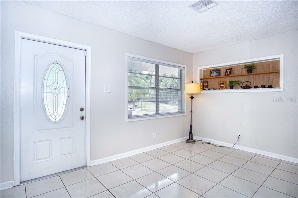 Property Photo:  8232 Gumwood Avenue  FL 33619 