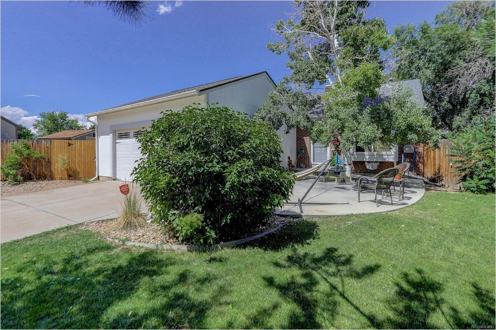 Property Photo:  3912 S Ensenada Court  CO 80013 