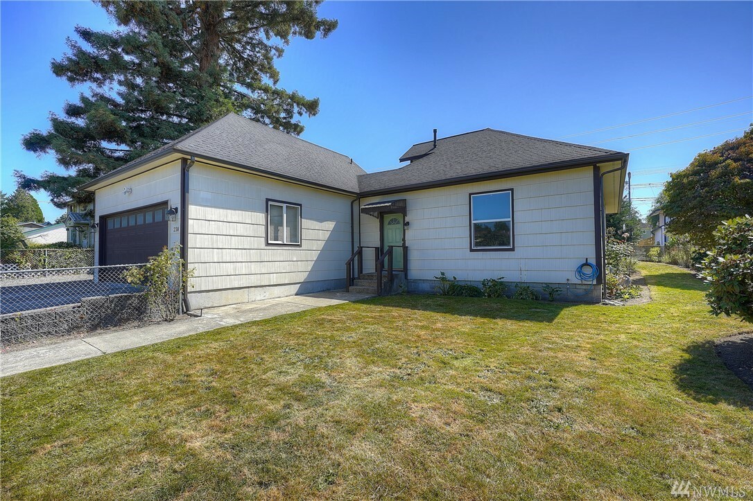 Property Photo:  238 E 63rd St  WA 98404 