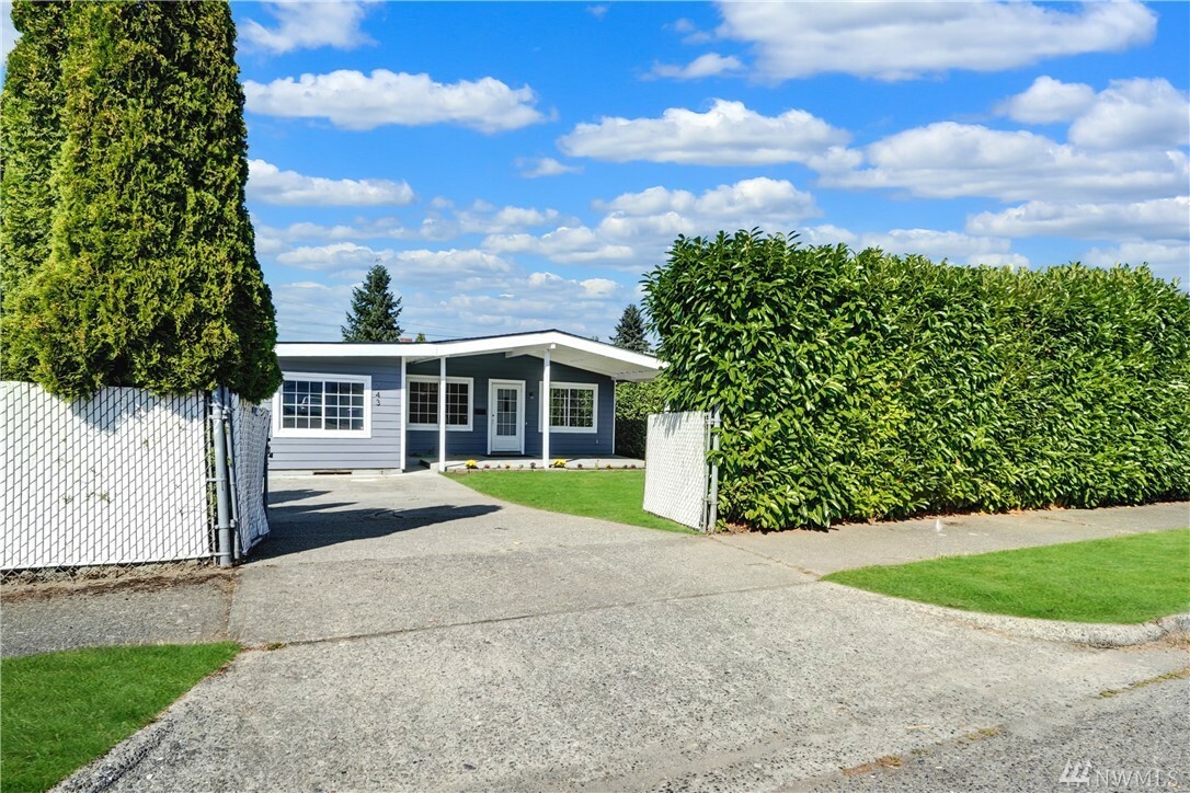 Property Photo:  243 E 61st Street  WA 98404 