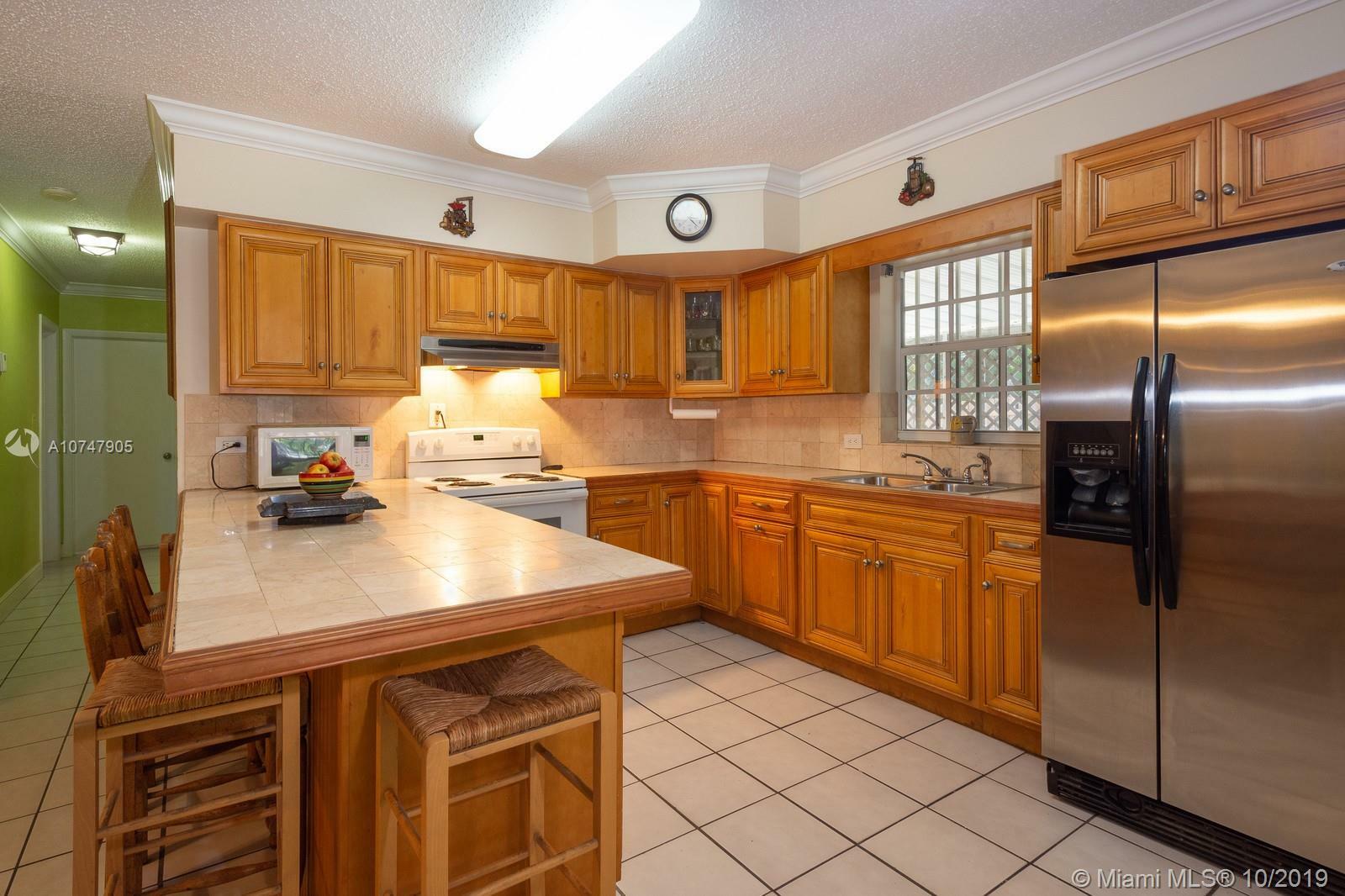 Property Photo:  13805 NE 16th Ave  FL 33161 