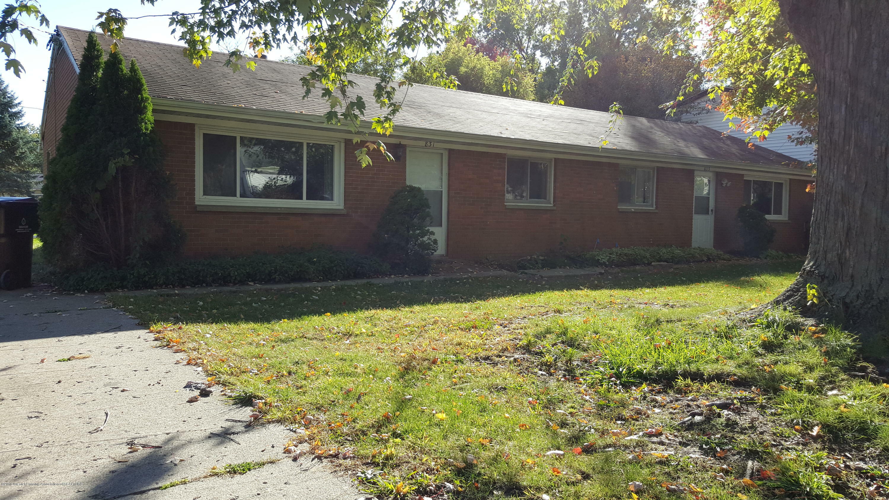 Property Photo:  831-833 Reo Road  MI 48910 