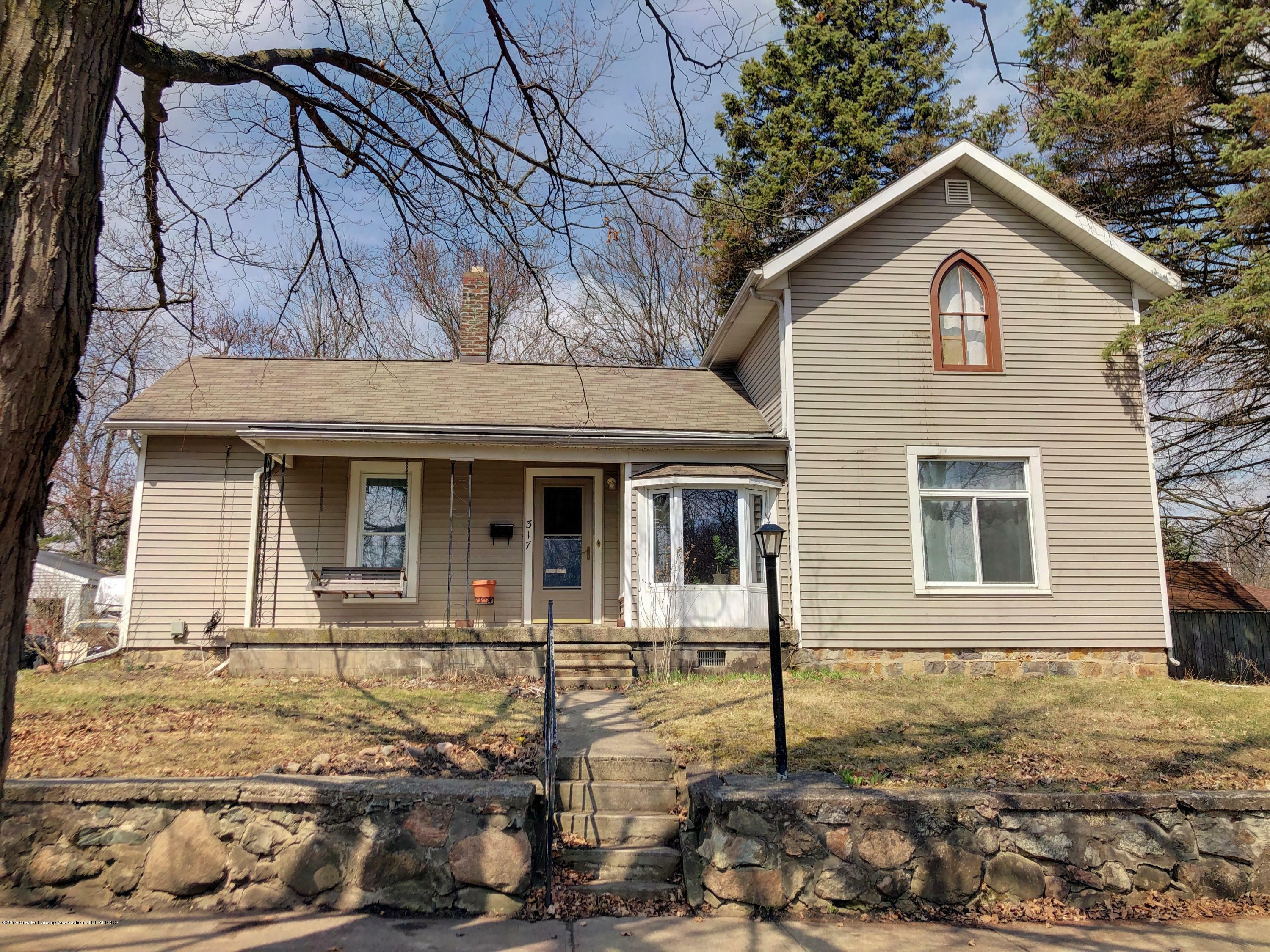 Property Photo:  317 Mineral Street  MI 48837 