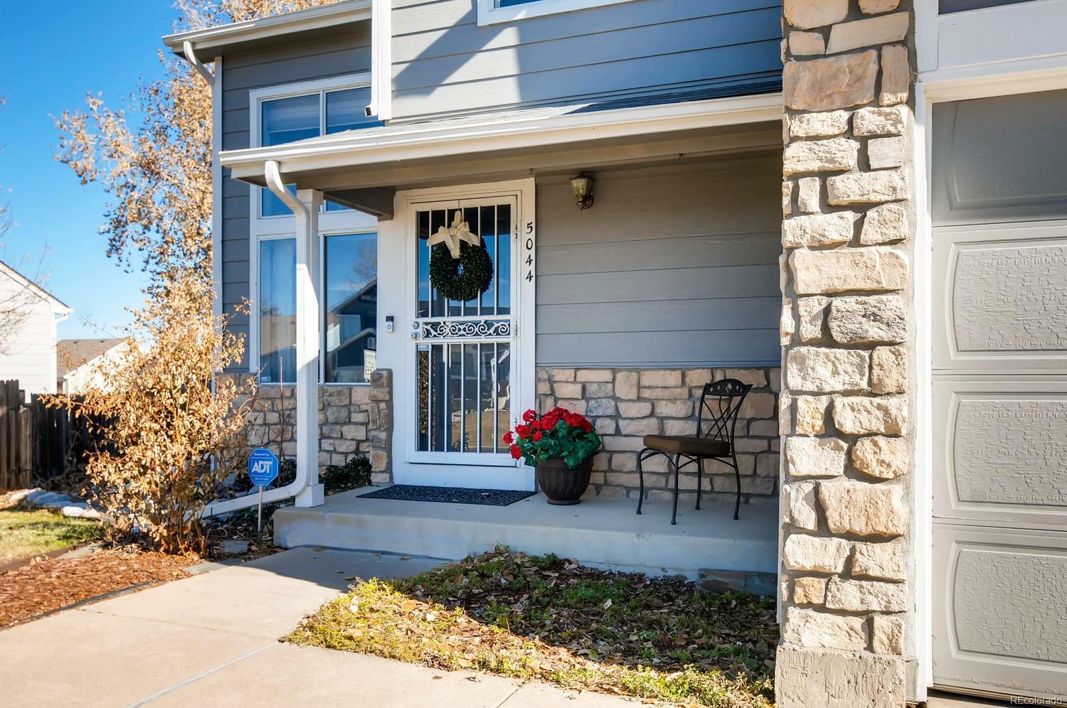 Property Photo: 5044 S Ensenada Way CO 80015