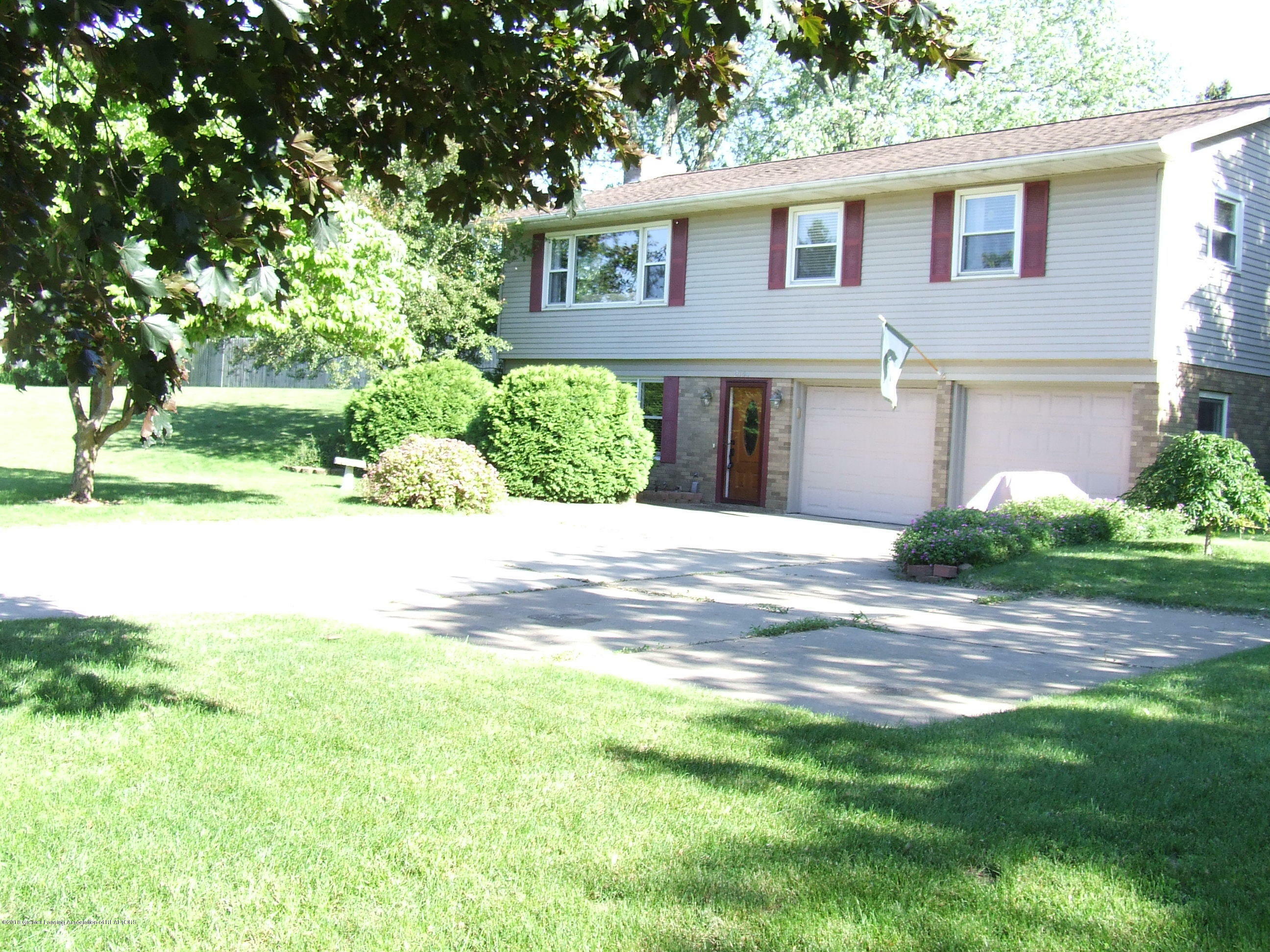 Property Photo:  2144 Holly Drive  MI 48813 