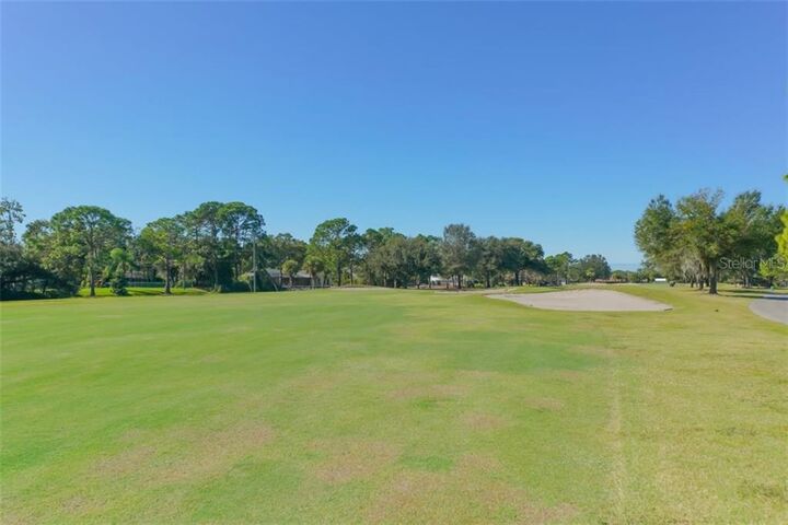 Property Photo:  5566 Country Club Way  FL 34243 