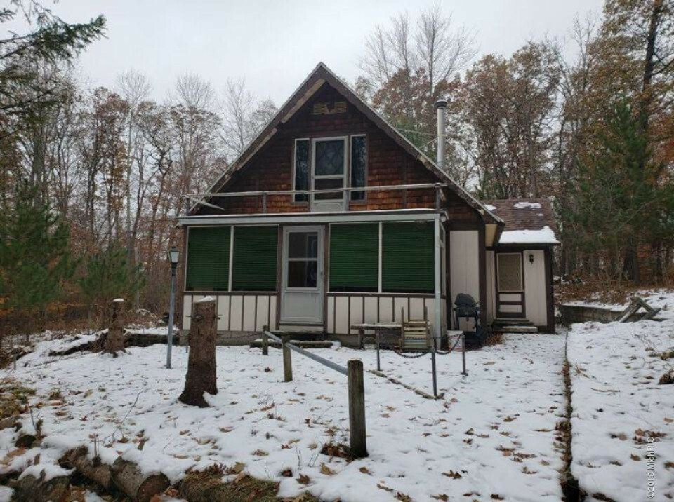 Property Photo:  6181 E 2 Mile Road  MI 49349 