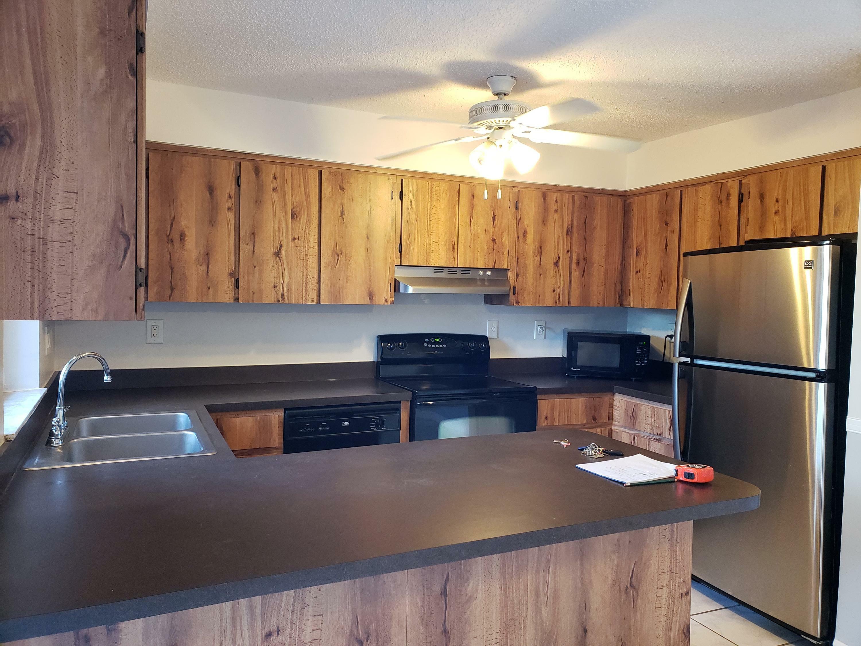 Property Photo:  4844 Alder Drive B  FL 33417 