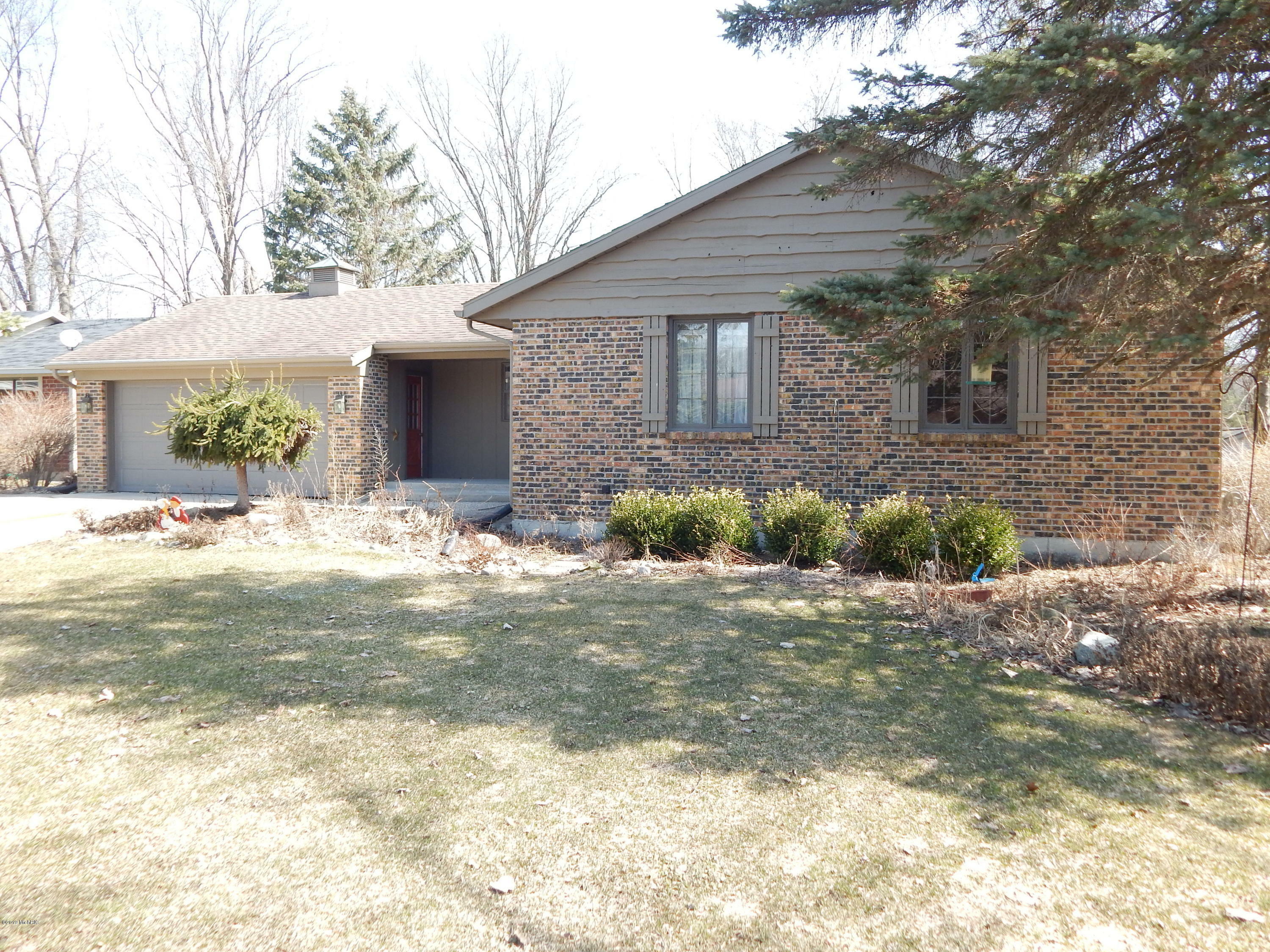 Property Photo:  3934 Basswood Drive SW  MI 49418 