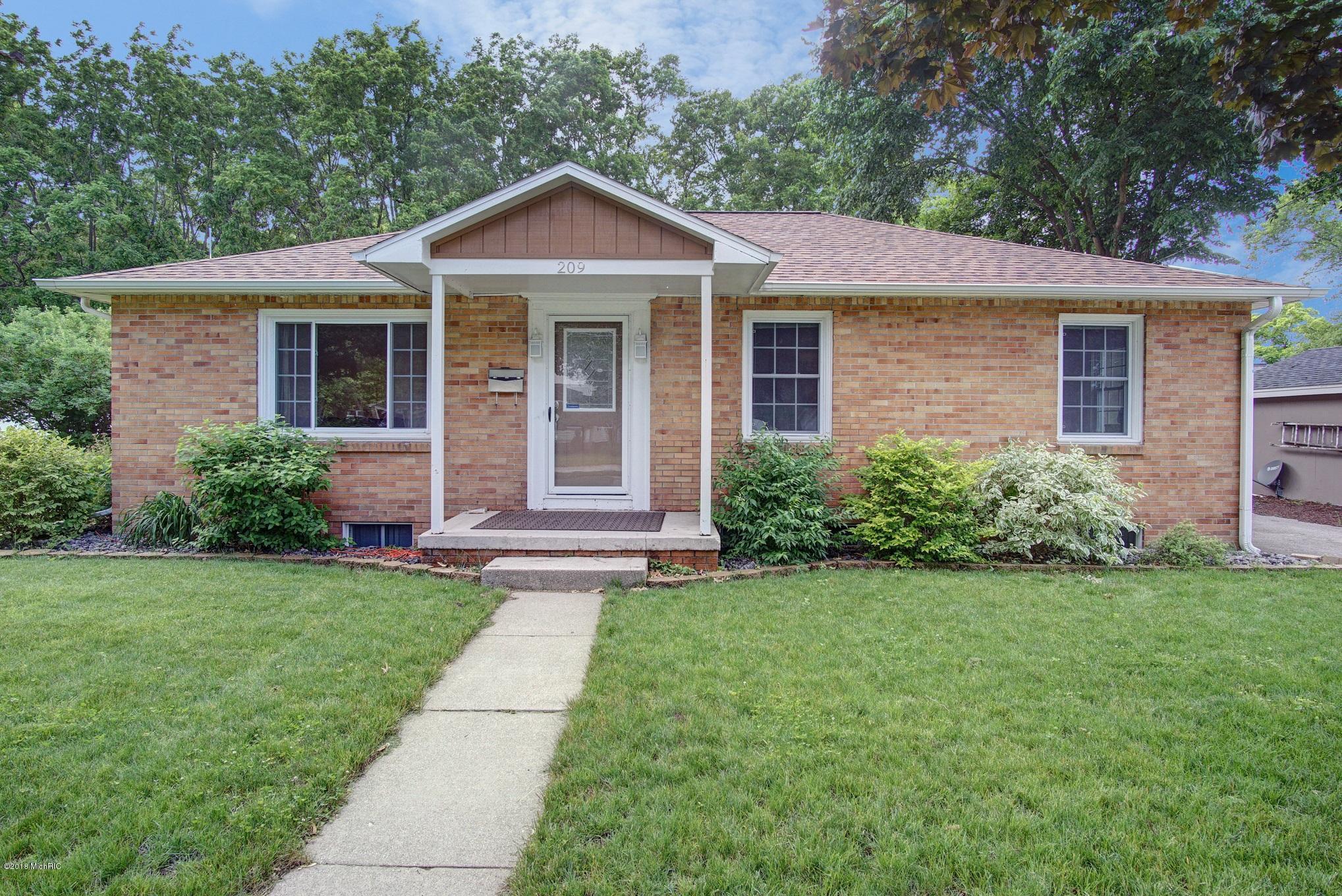 Property Photo:  209 William Street  MI 49456 