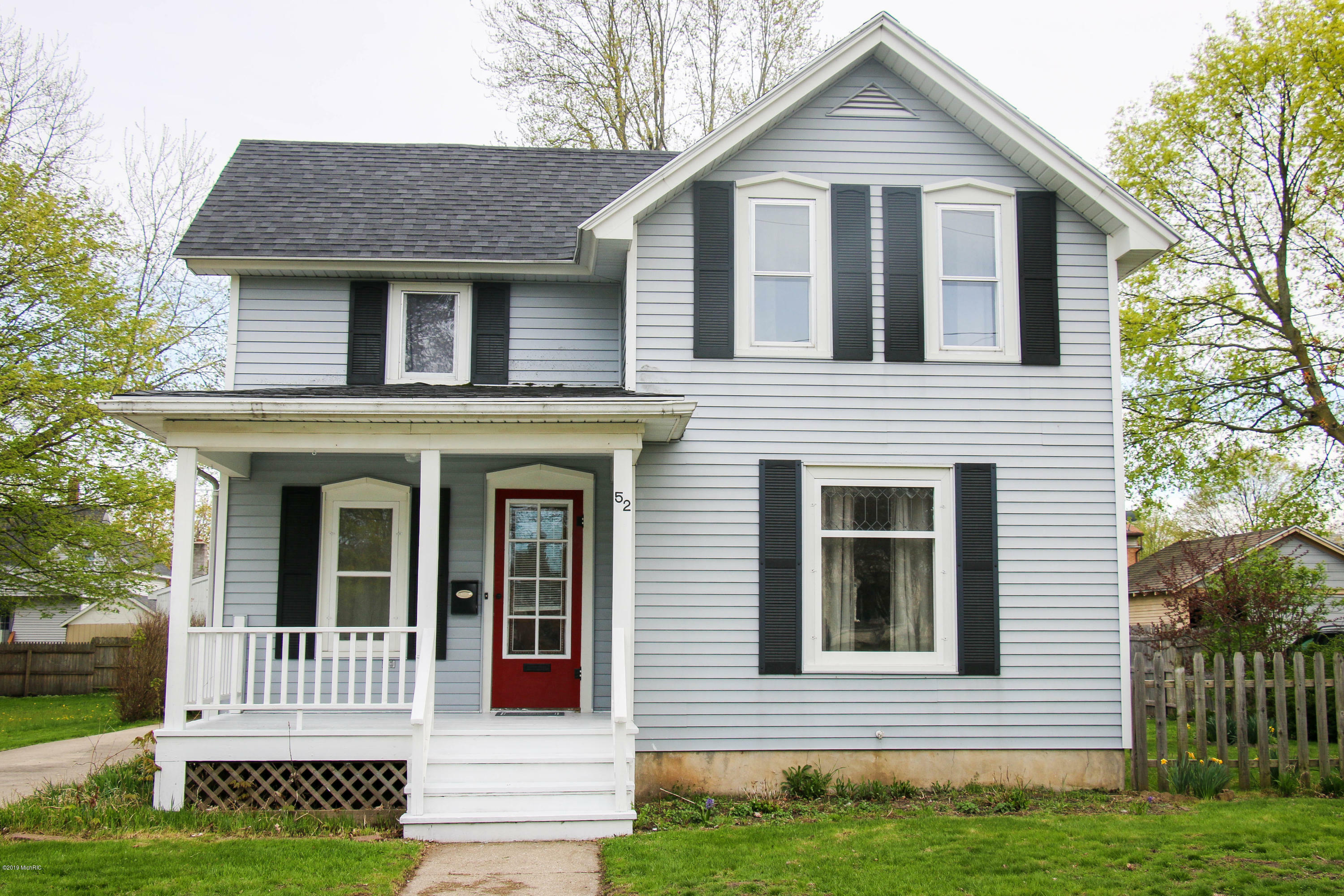 Property Photo:  52 Centennial Street  MI 49345 