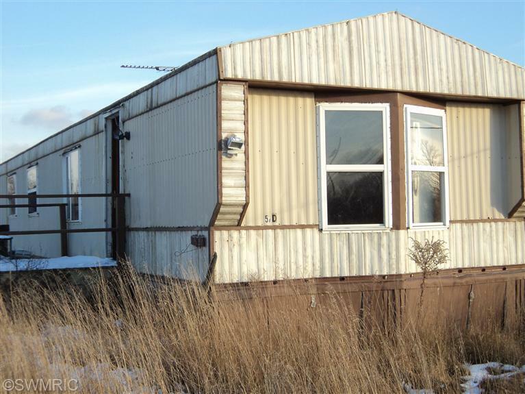 Property Photo:  110 S Oak Avenue  MI 49349 