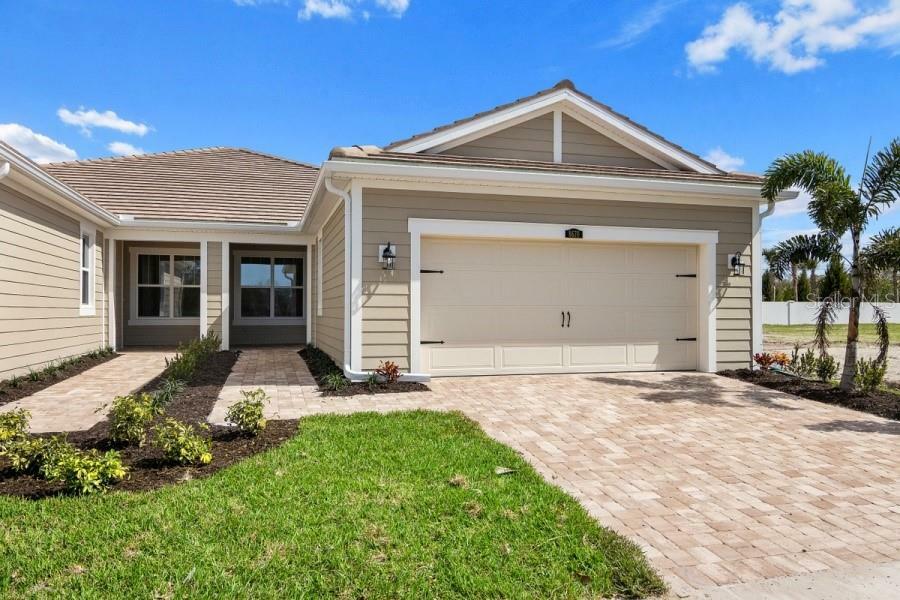 Property Photo: 8670 Rain Song Road 311 FL 34238