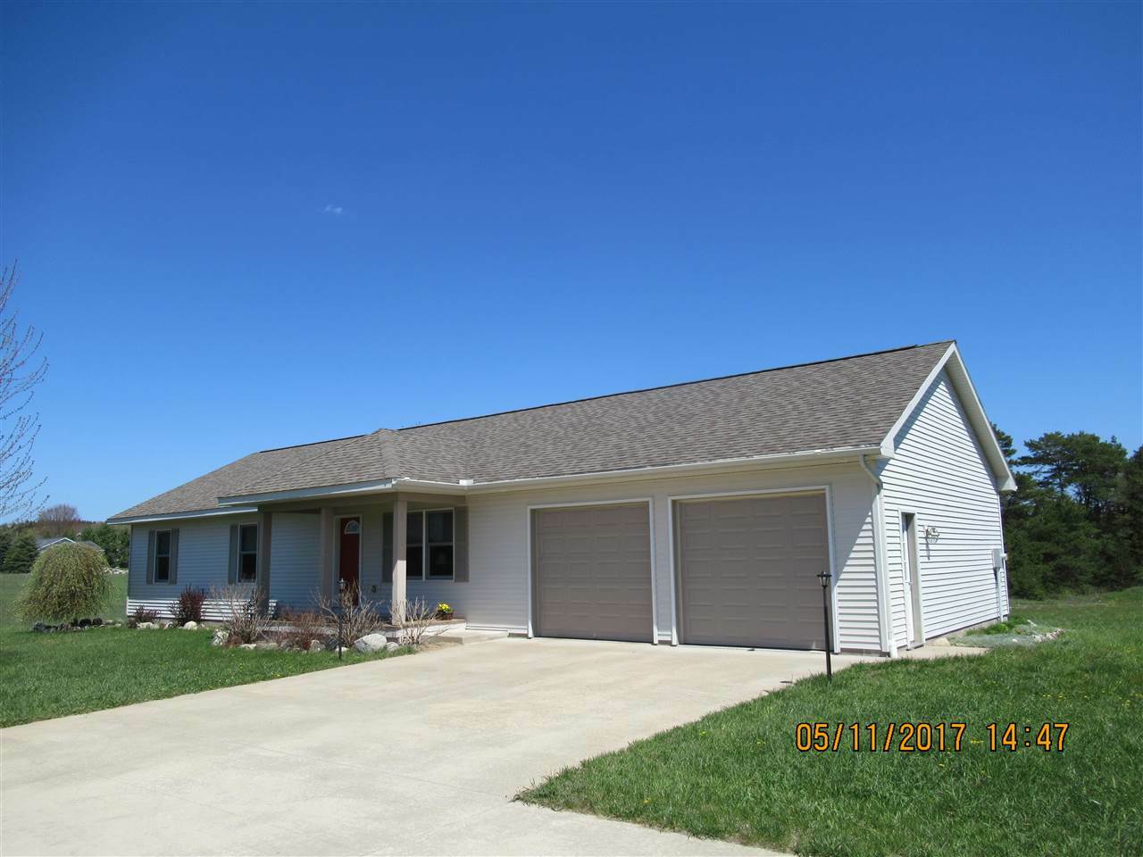 Property Photo: 7827 Bay Meadows MI 49740