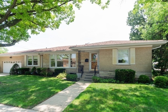Property Photo: 8749 West Wilson Avenue IL 60656