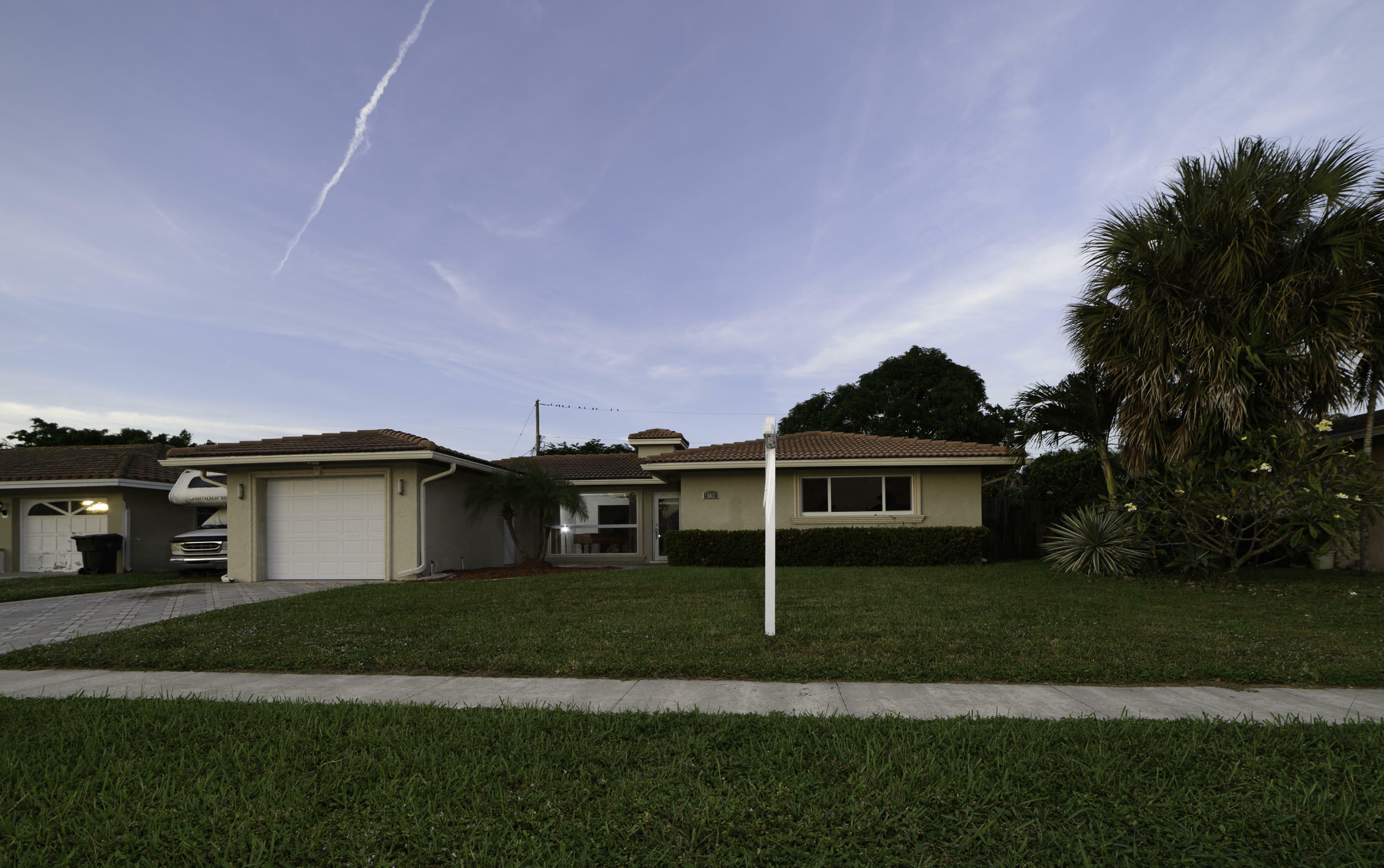 Property Photo:  562 NW 13th Drive  FL 33486 