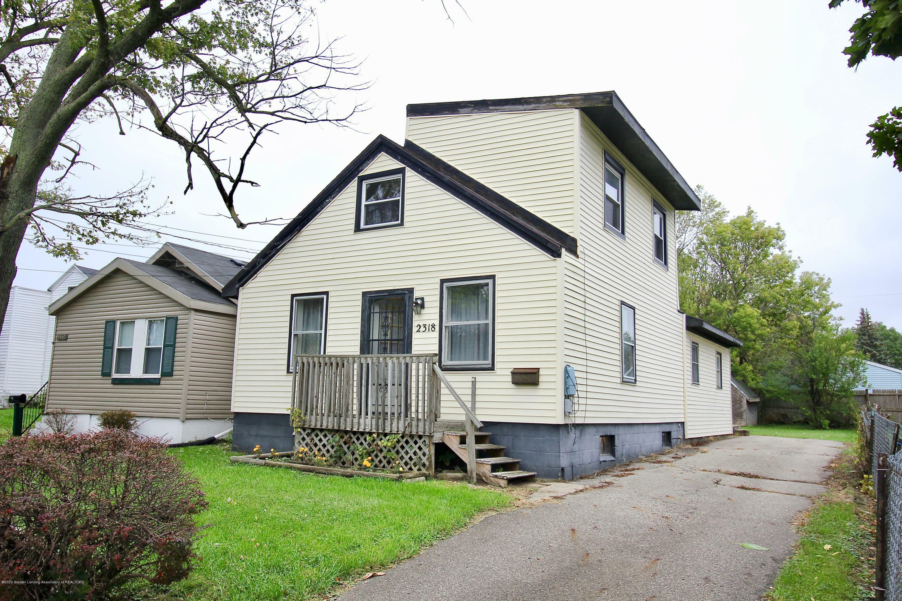 Property Photo:  2318 N High Street  MI 48906 