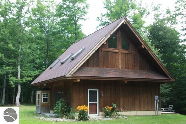 Property Photo:  12805 Kitlinger Road  MI 49630 