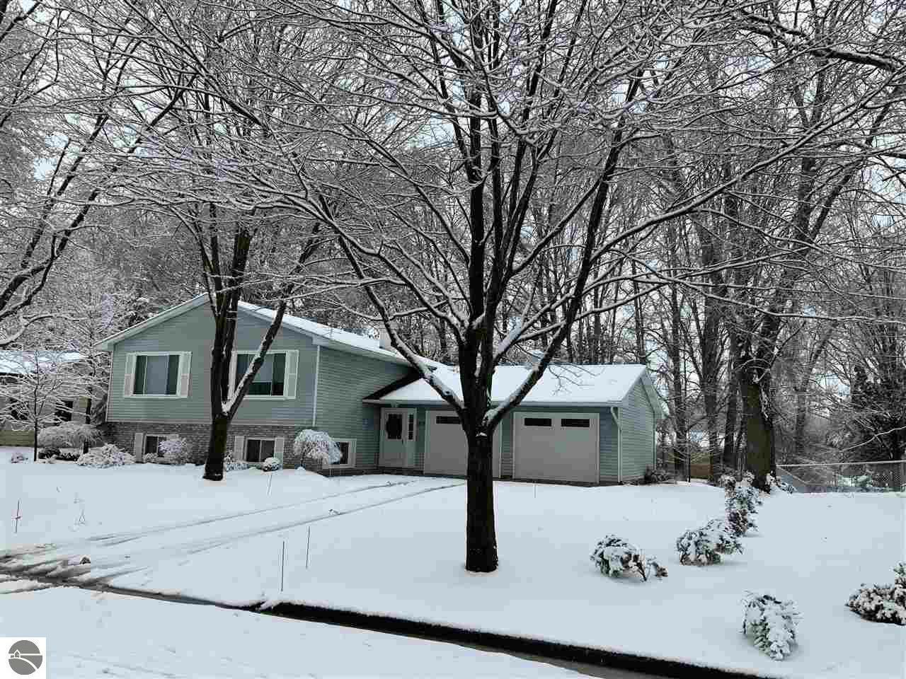 Property Photo:  1213 Tomah Drive  MI 48858 