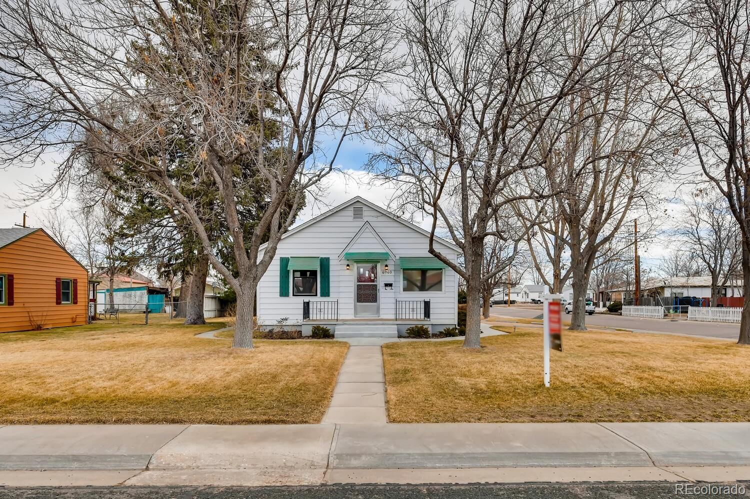 Property Photo:  6960 Olive Street  CO 80022 