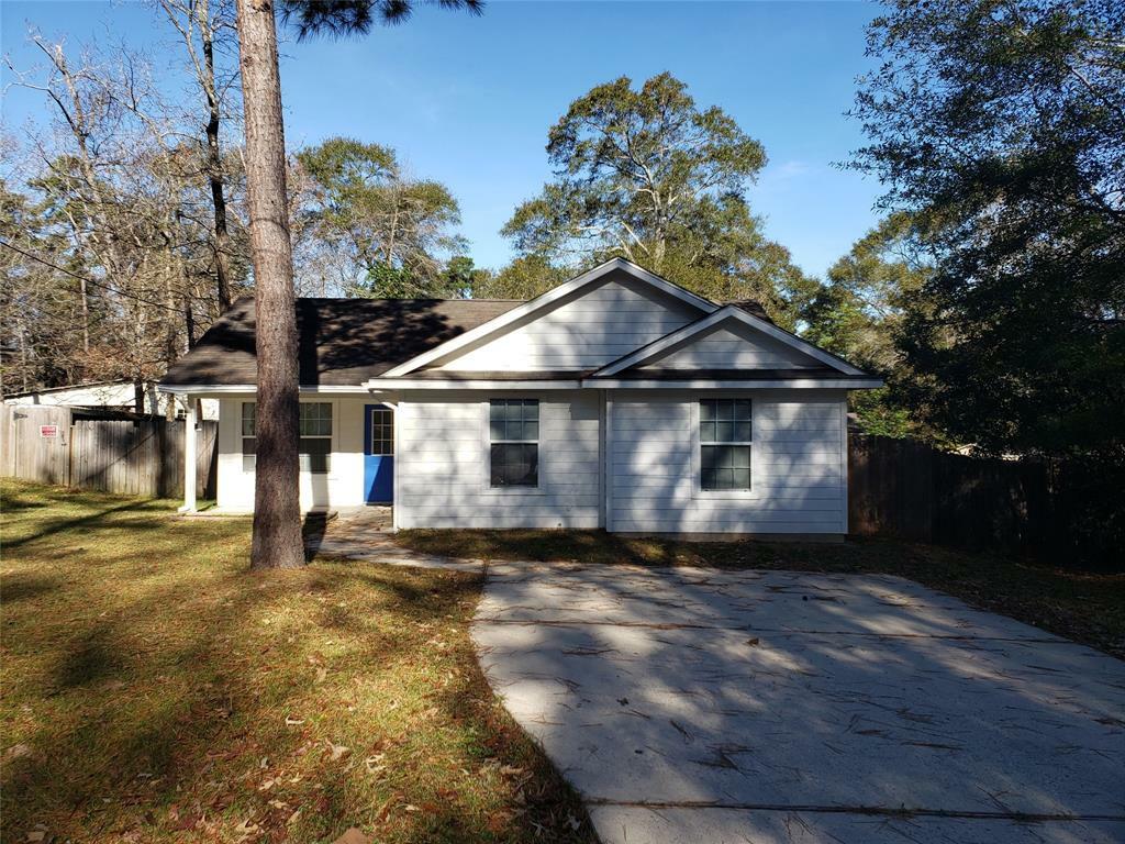 Property Photo: 10793 Royal Magnolia Drive TX 77303