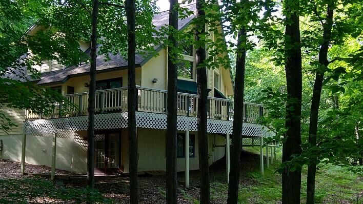 Property Photo:  6913 Mountain Pass  MI 49735 