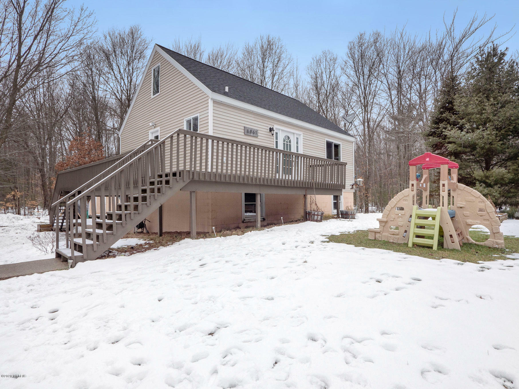 Property Photo:  6861 S Quarterline Road  MI 49456 