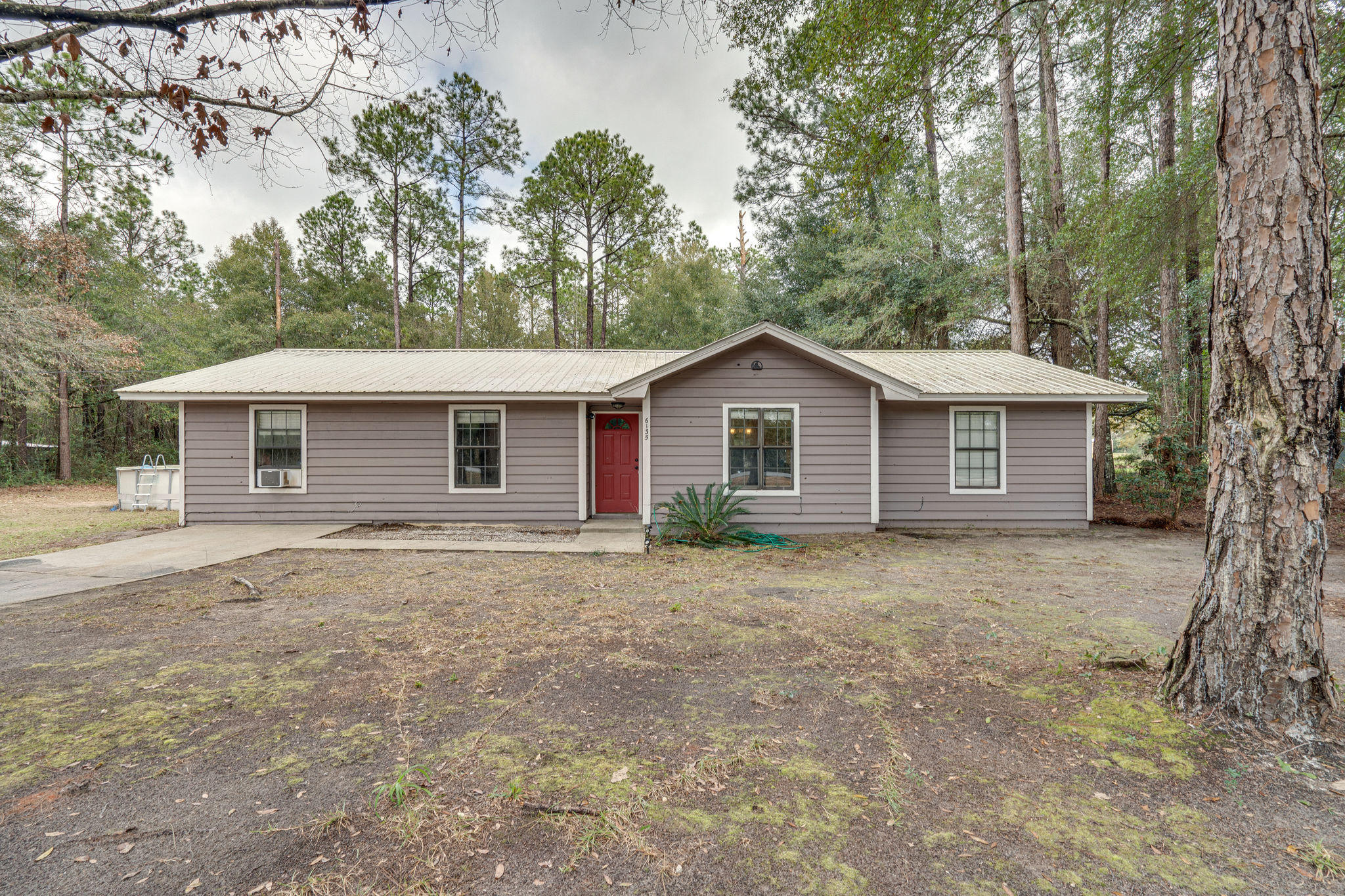 Property Photo: 6135 Garden City Road FL 32539