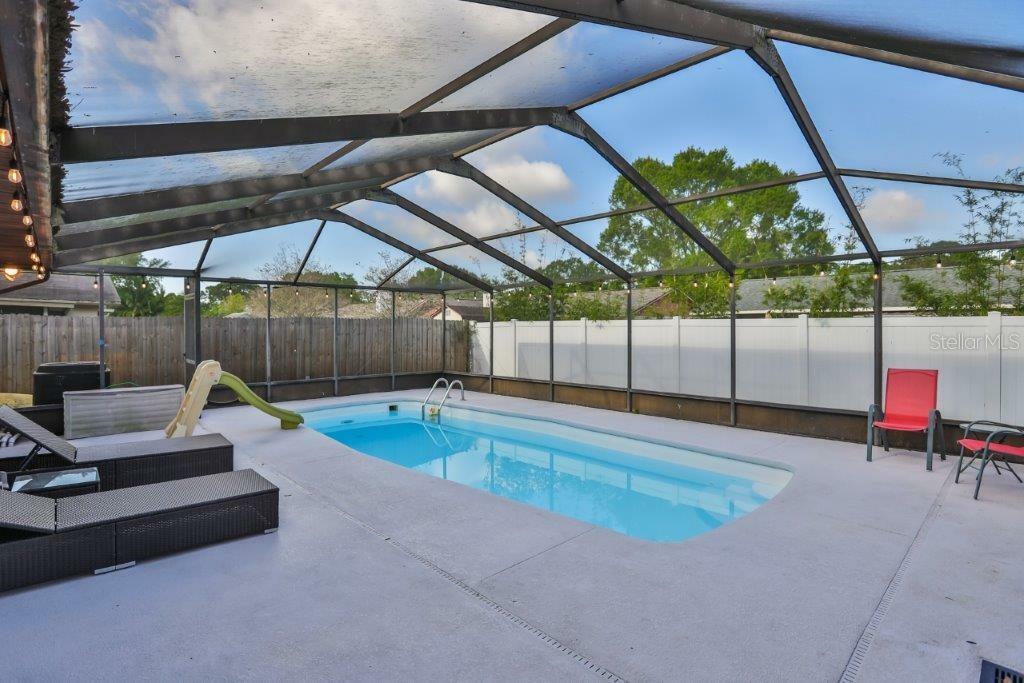 Property Photo:  7910 Singing Court Place  FL 33615 