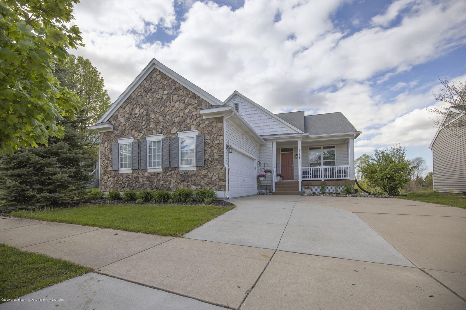 Property Photo:  6965 Castleton Drive  MI 48837 