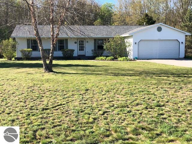 Property Photo:  5928 Cherry Blossom Drive  MI 49685 