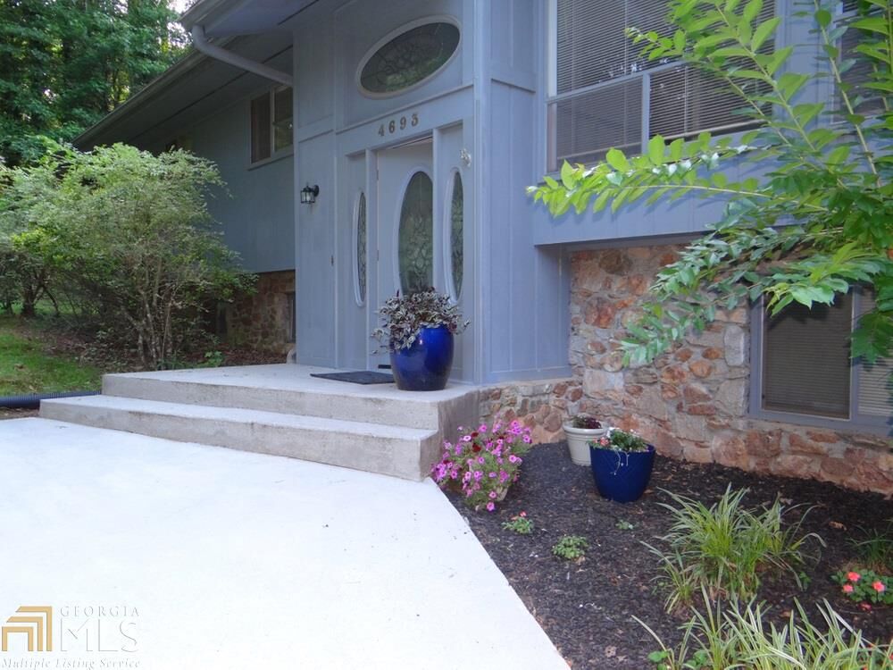 Property Photo:  4693 Rivercliff Dr  GA 30047 
