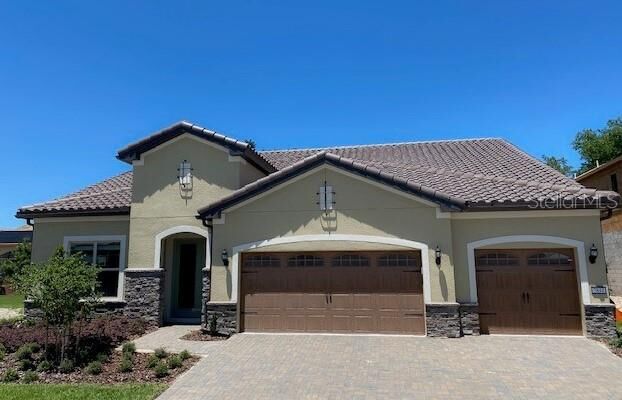 Property Photo:  7844 Wandering Way  FL 32836 