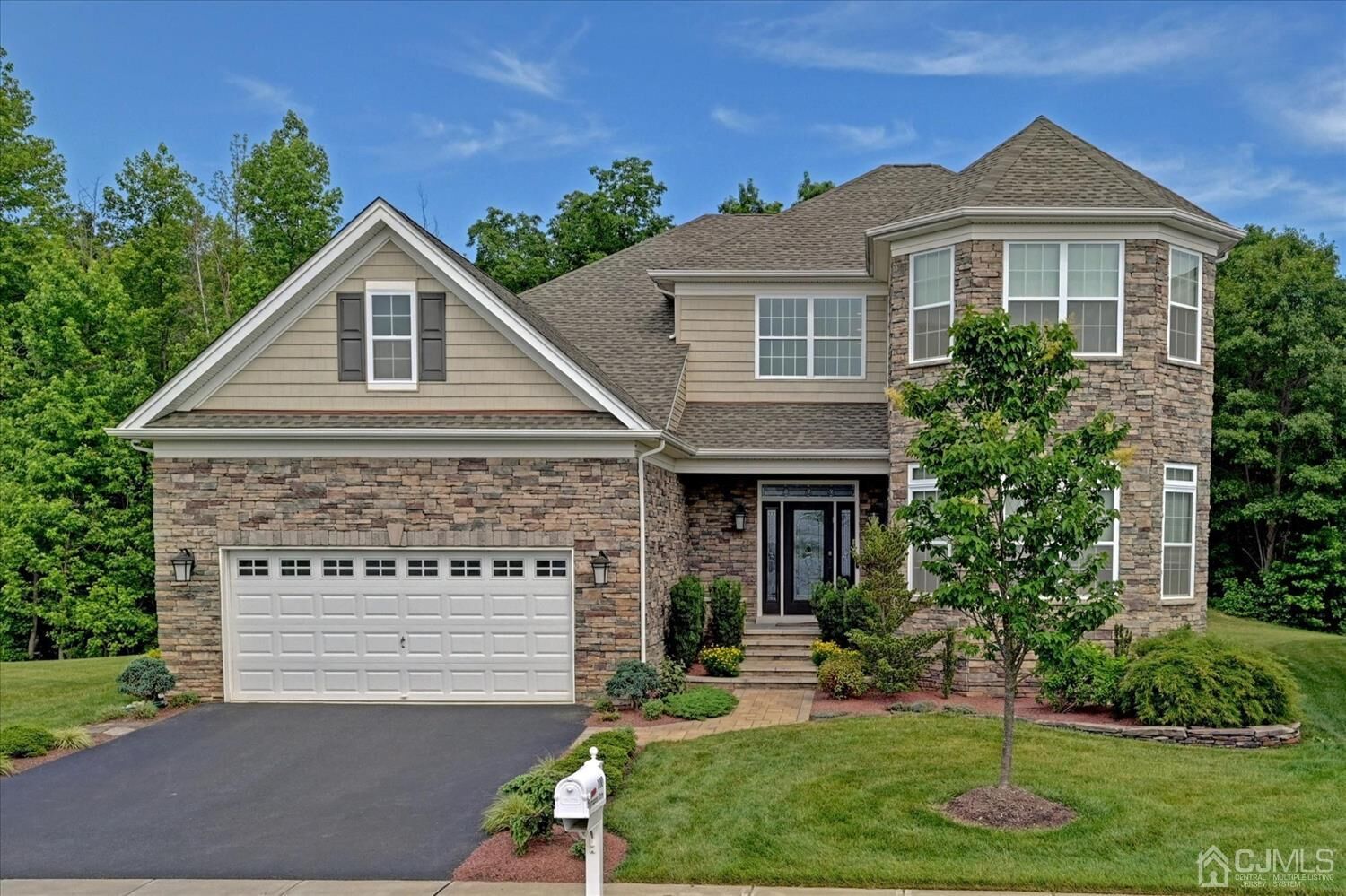Property Photo:  100 Tournament Drive  NJ 08831 