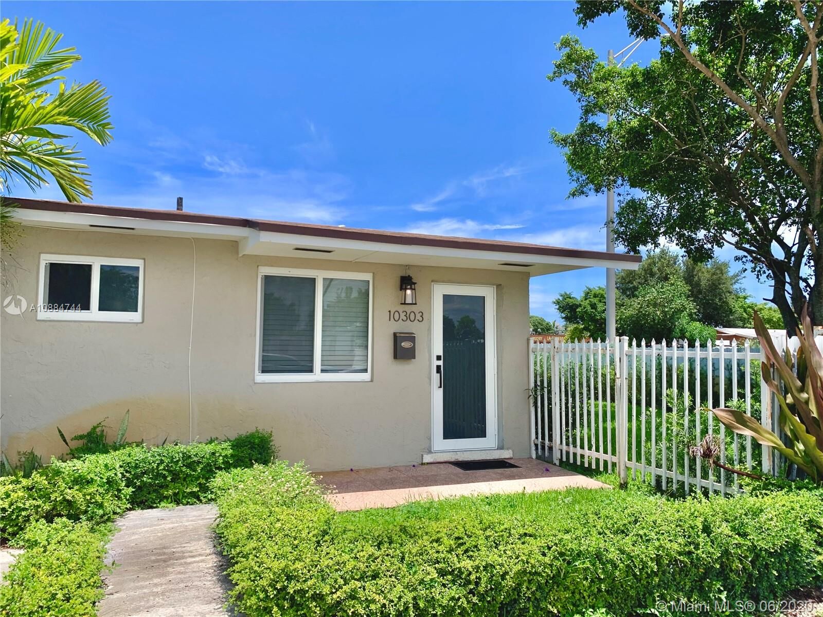 Property Photo: 10303 NW 35th Pl . FL 33147