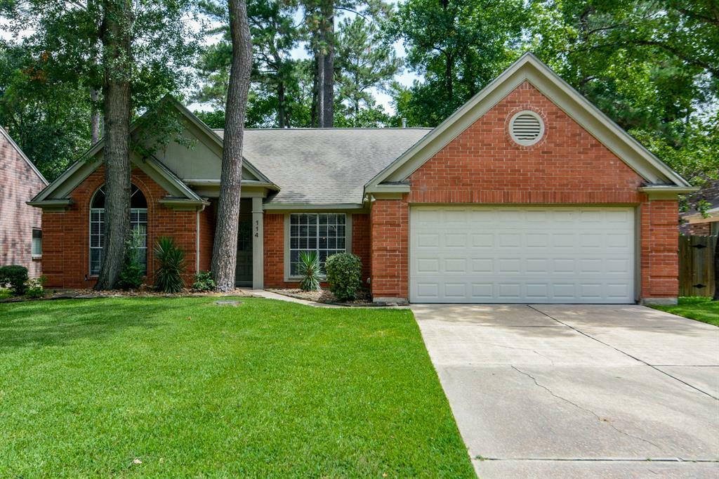 Property Photo:  114 S Village Knoll Circle  TX 77381 