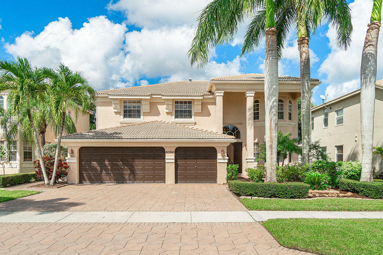 Property Photo:  6584 Marbletree Lane  FL 33467 