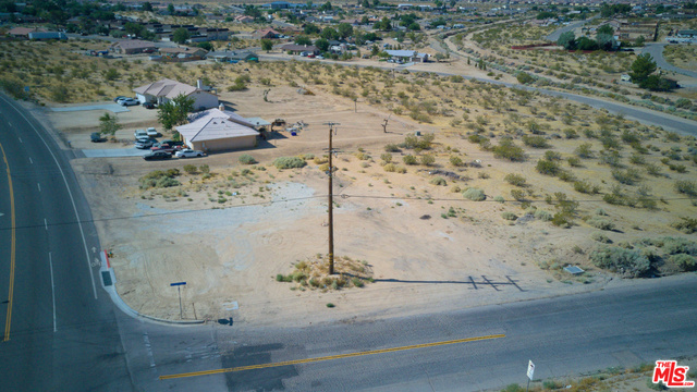 Property Photo:  16480 Village Dr  CA 92394 