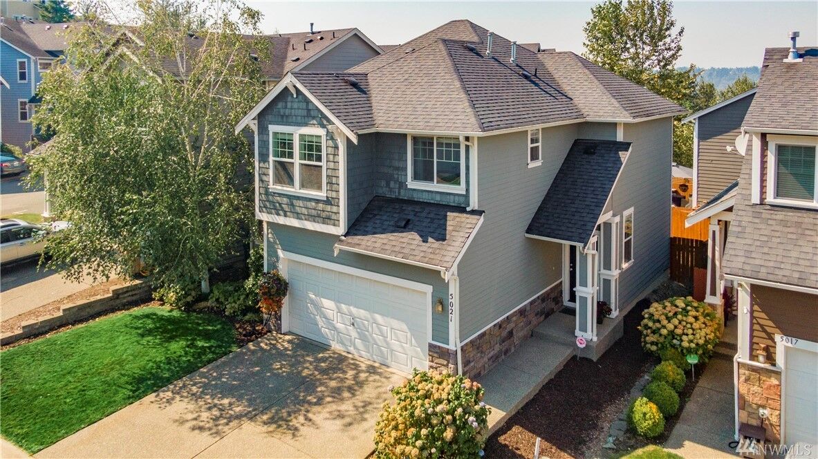 Property Photo: 5021 Elliot Court SE 106 WA 98092