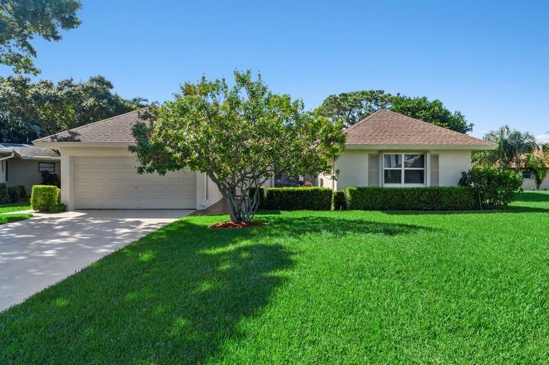 Property Photo:  10355 Greentrail Drive N  FL 33436 