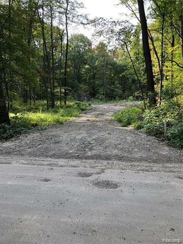 Property Photo:  7719 Chamberlin Road  MI 48130 