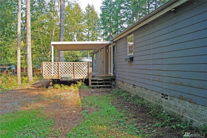 Property Photo: 511 E Timberlakes Dr E WA 98584