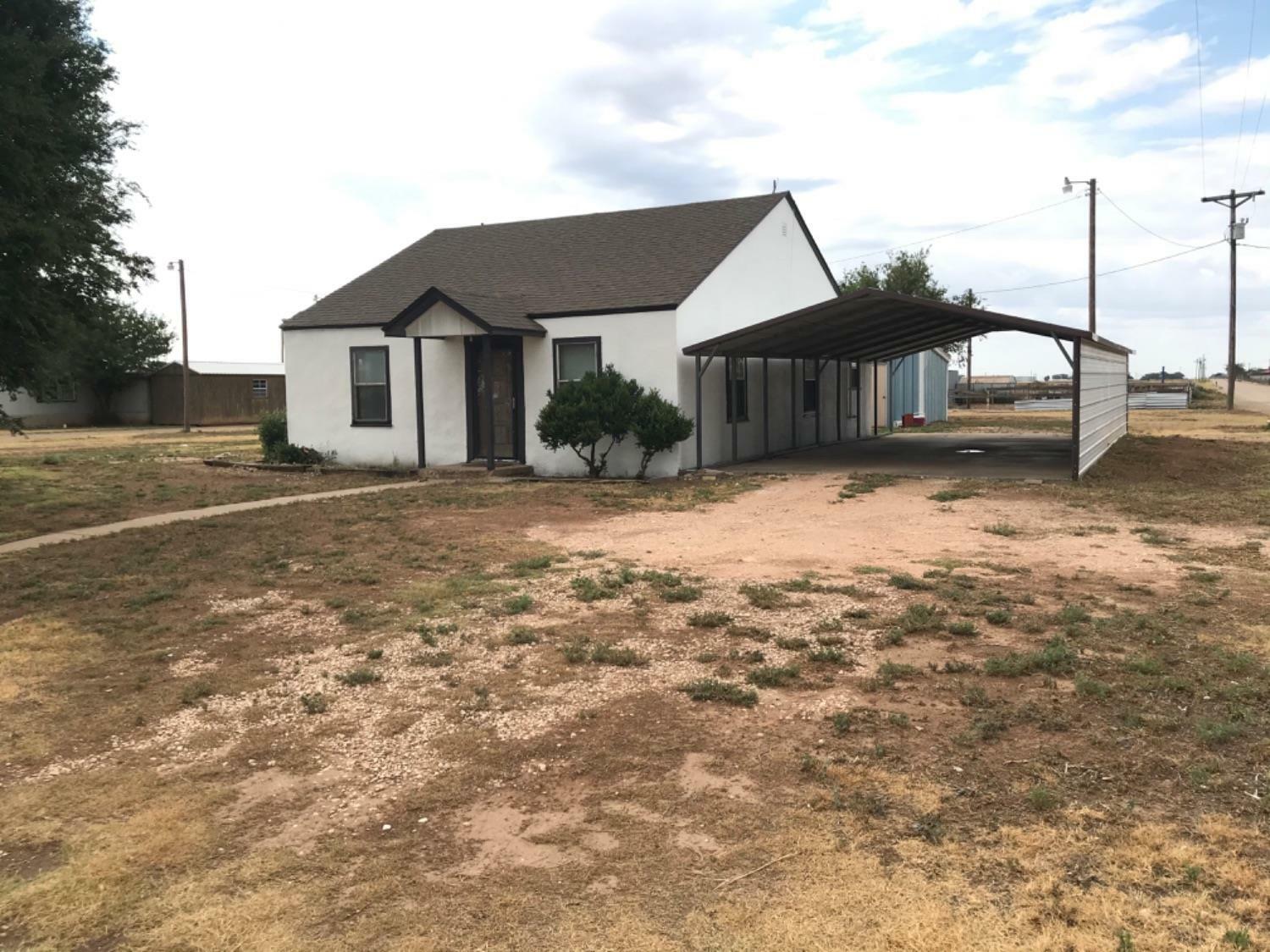 Property Photo:  104 E County Road 7300  TX 79404 