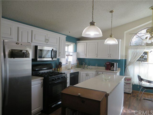 Property Photo: 140 W Pioneer Avenue 18 CA 92374